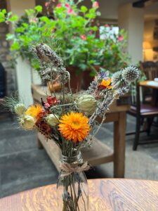 Dried flower arrangement in glass vase