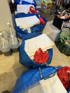 Ikea bags of clean laundry for Long Barn changeover