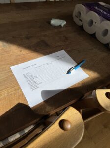 Printed laundry list for the Long Barn with pen to be filled in