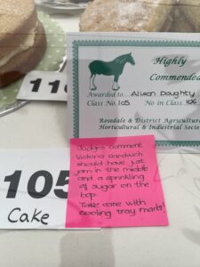 Pink post it with judges feedback for a victoria sponge