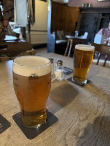 Two pints of pulled ale in pub